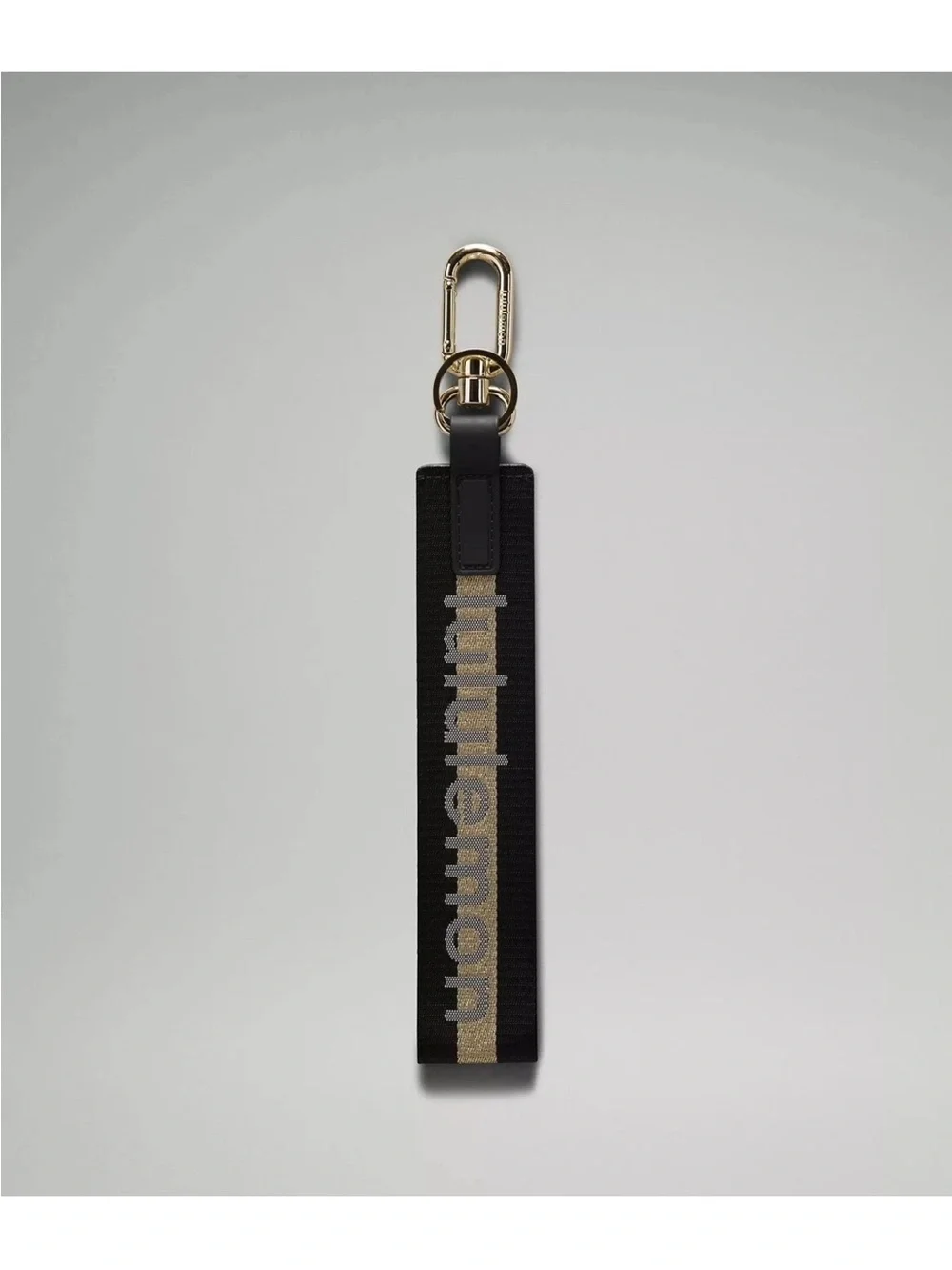 NWT Never Lost Keychain Black/ Gold Wordmark O/S
